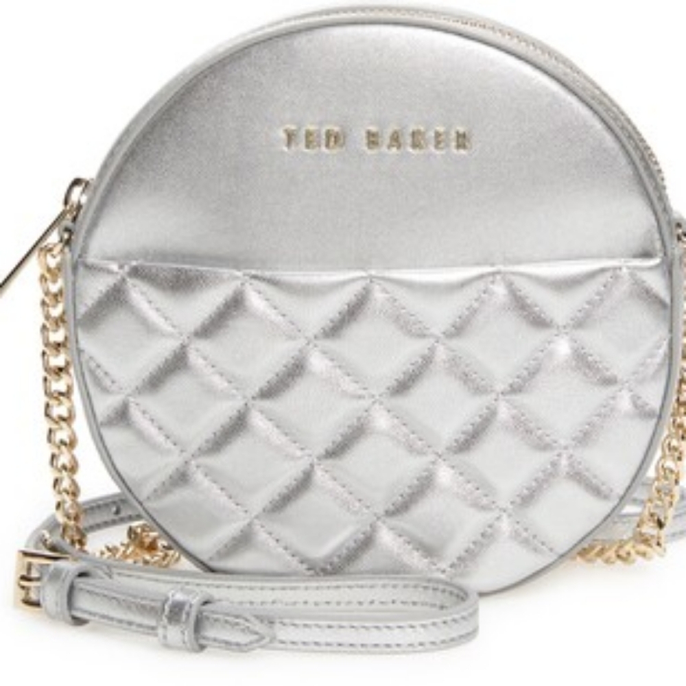 CIRRCUS QUILTED LEATHER CIRCLE CROSSBODY BAG IN SILVER